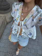 Semi-Sheer Tie Front Floral Blouse
