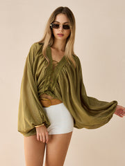 Semi-Sheer Striped Lace-Up Blouse with Batwing Sleeves