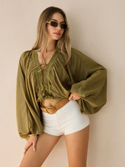 Semi-Sheer Striped Lace-Up Blouse with Batwing Sleeves