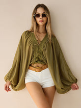 Semi-Sheer Striped Lace-Up Blouse with Batwing Sleeves