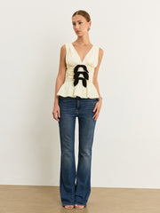 Bow-Detail Ruched Top with Peplum Hem