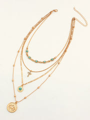 Layered Gold Tone Necklace with Turquoise and Charms