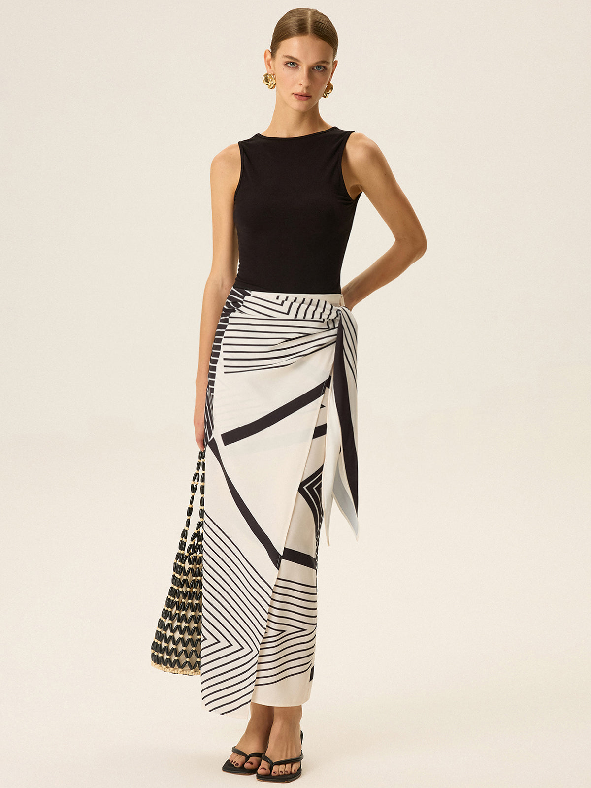 Sleeveless Top and Print Wrap Skirt Set
